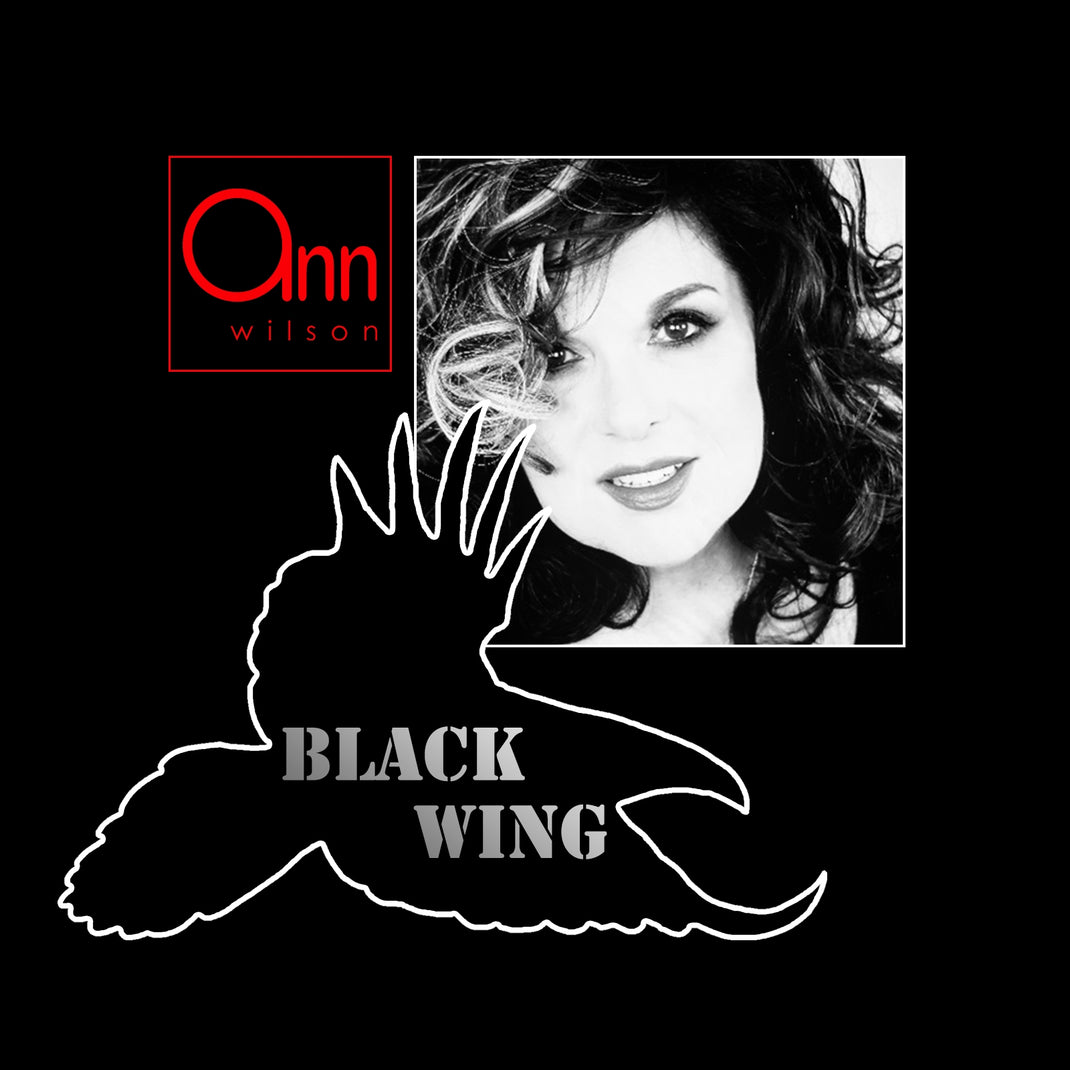 Album cover with a woman's face, 'Ann Wilson', and 'Black Wing' text on a black background.